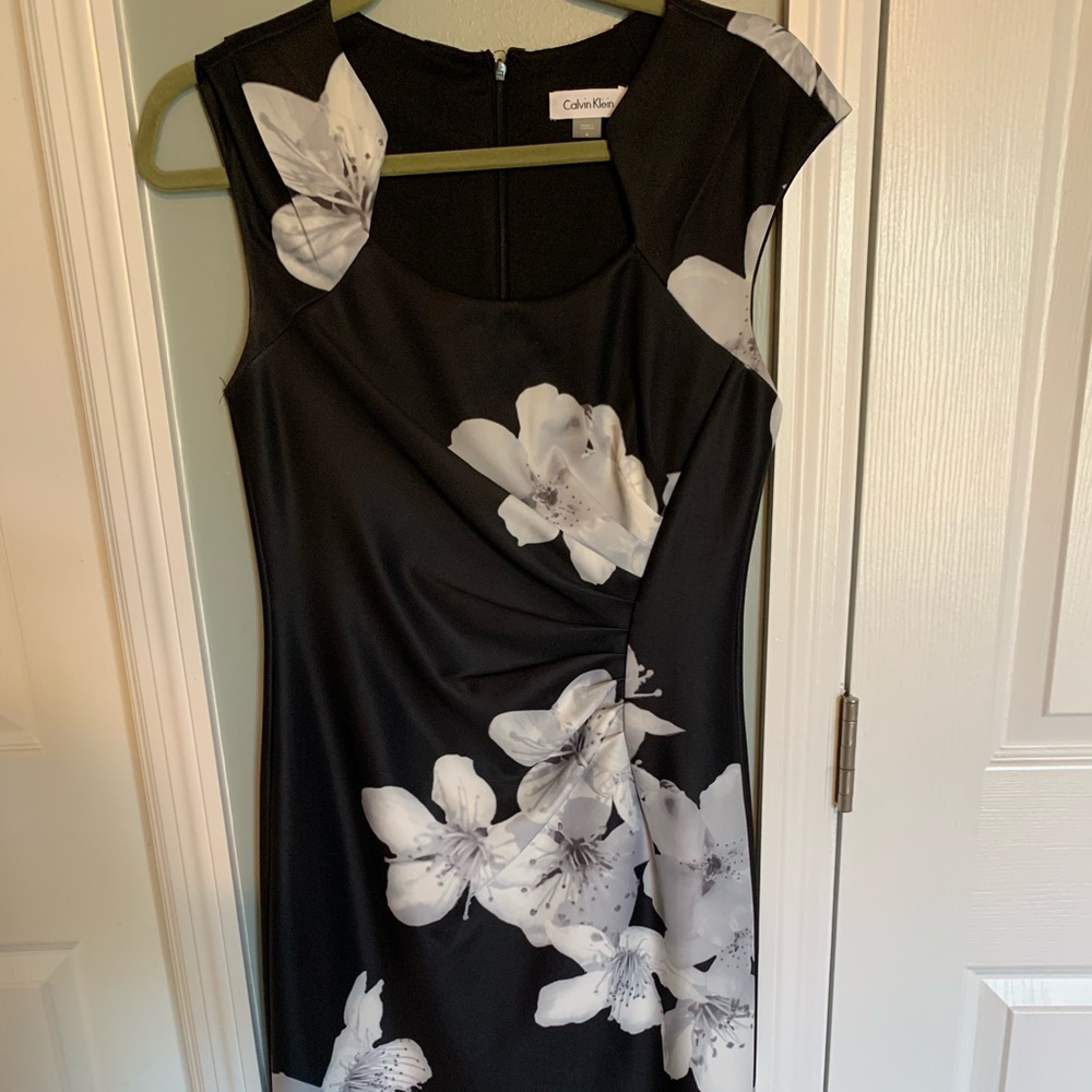 Calvin Klein black fitted faux wrap dress.